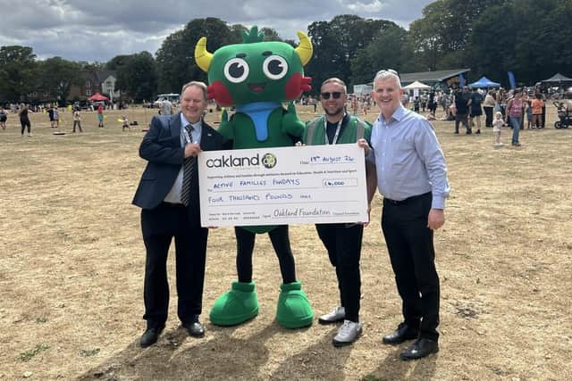 L to R: Councillor Brian Benneyworth, North Northamptonshire Council's Executive Member for Housing, Communities and Leisure, and Wesley Neville, Active Families Manager, at the Active Fundays event in Rushden's Spencer Park and Oakland Foundation Trustee and Grants Co-ordinator Mark Williams