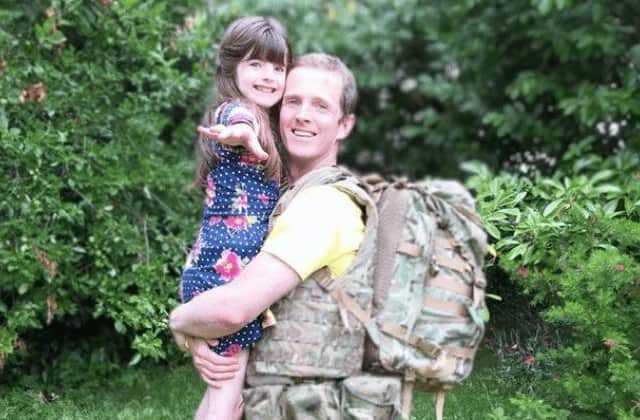 Army Major Chris Brannigan, 40, is raising money to fund research into Cornelia de Lange Syndrome (CdLS), a rare genetic condition his eight-year-old daughter Hasti was born with (Photo: JustGiving)