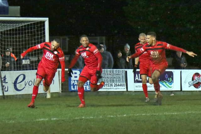 Rhys Hoenes heads off to celebrate after scoring Kettering Town's third goal in Tuesday's NFA Hillier Senior Cup semi-final with AFC Rushden & Diamonds. The Poppies are back on home soil in the league this weekend when they face Tiverton Town. Picture by Peter Short