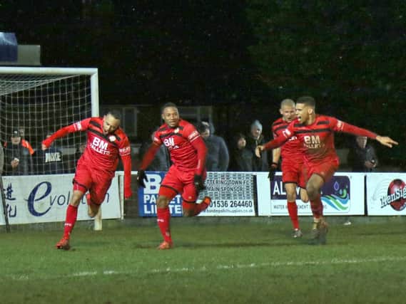 Rhys Hoenes heads off to celebrate after scoring Kettering Town's third goal in Tuesday's NFA Hillier Senior Cup semi-final with AFC Rushden & Diamonds. The Poppies are back on home soil in the league this weekend when they face Tiverton Town. Picture by Peter Short