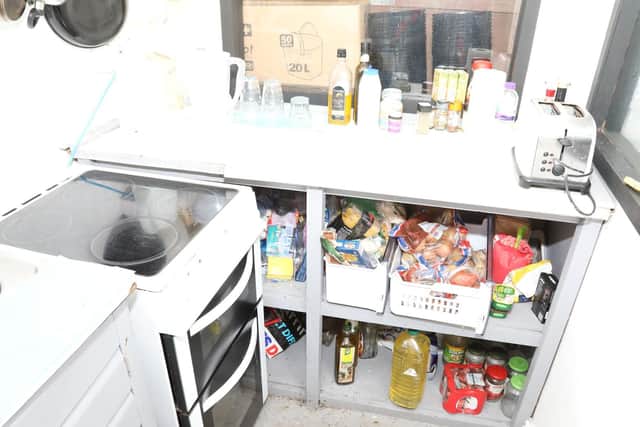 A person was found to be living inside the unit.