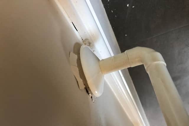 This pipe came away from the wall and was left in this state