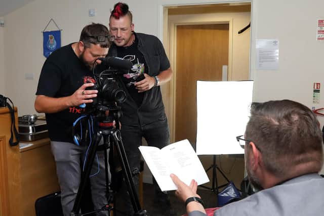 The Poet ready on set