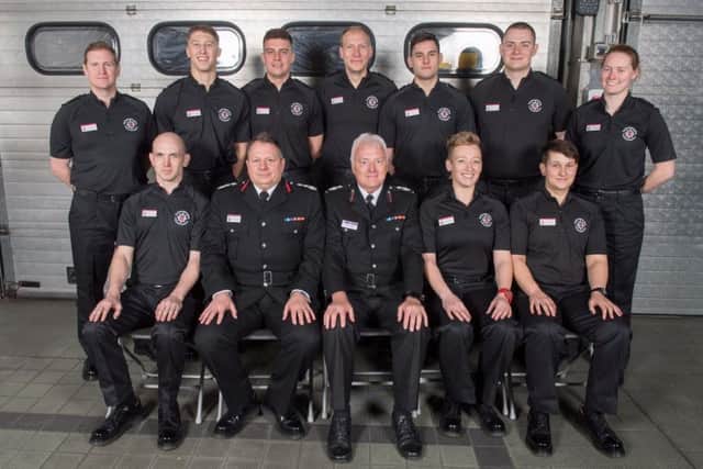 New recruits with Chief Fire Officer Darren Dovey (front row, second from left) and Deputy Chief Fire Officer David Harding (front row, centre) NNL-170112-102352005