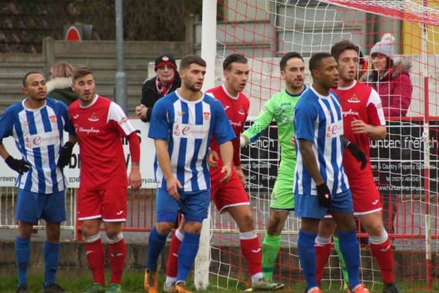 Action from the Poppies' 2-2 draw at Frome