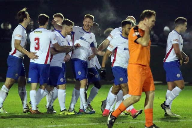 Ben Farrell was all smiles after he wrapped up AFC Rushden & Diamonds' 2-0 victory over Hartley Wintney at Hayden Road. Pictures by Alison Bagley