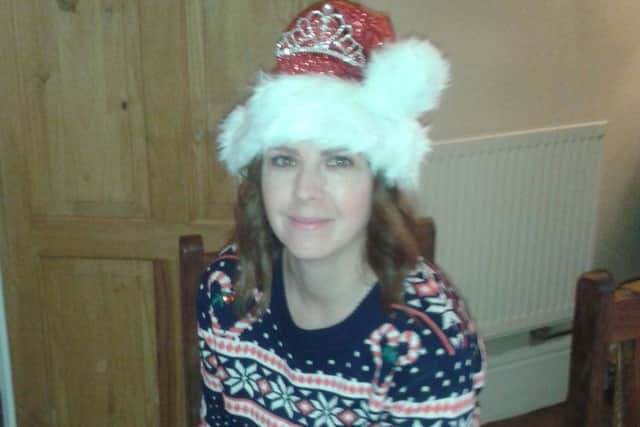 Cat Anderson in her Christmas jumper in 2014