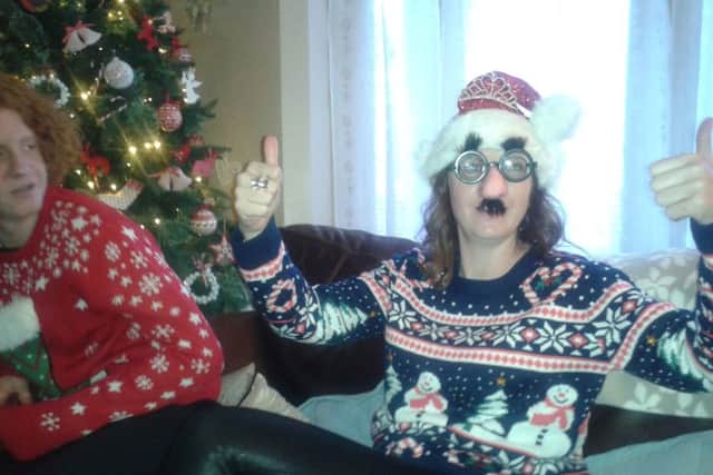 Cat Anderson with son James celebrating Christmas in 2014