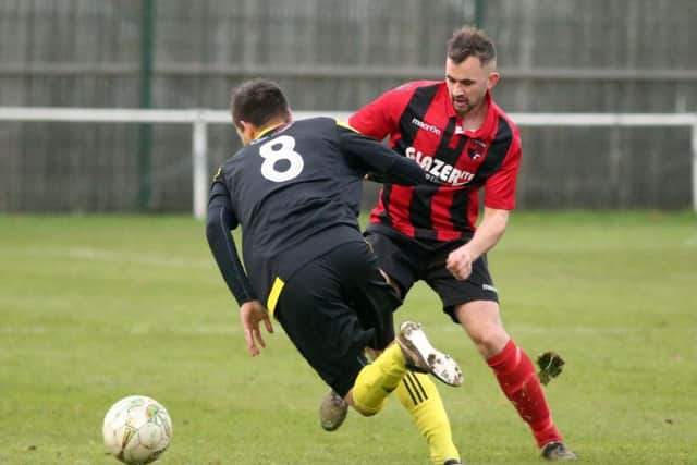 Action from Whitworth's 6-0 home defeat to Holbeach United in the UCL Premier Division last weekend. Picture by Alison Bagley