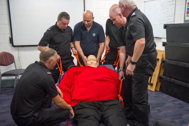 The mannequin is used in a manual handling training refresher for firefighters