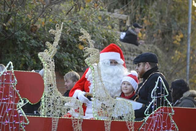 Father Christmas with Raunds mayor Nick Beck at the lights switch-on