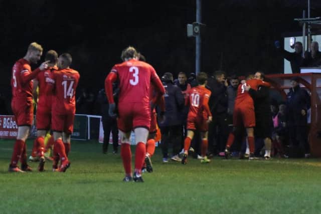 Kettering Town celebrate Rene Howe's goal, which capped their 2-0 success over Stratford Town at Latimer Park. Pictures by Peter Short