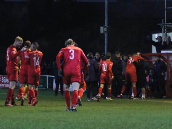 Kettering Town celebrate Rene Howe's goal, which capped their 2-0 success over Stratford Town at Latimer Park. Pictures by Peter Short