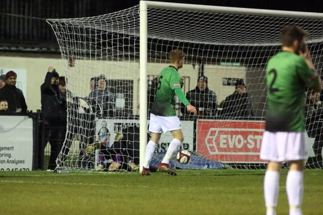 The ball is in the net as Sam Mulready bags the Steelmen's second goal