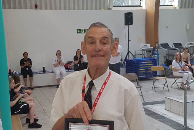 Roger Patrick receiving an award earlier this year. NNL-171212-133713005