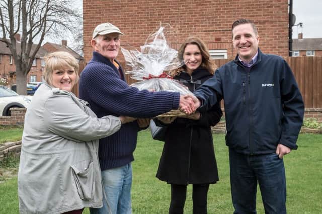 Gerald receiving his gift from the Longhurst Group
