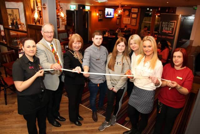 Pub Refurbished: Wellingborough: Ock 'n' Dough official opening after refurbishment.
Standing in what was once the soft play area, VIPs cut the ribbon at the opening.
Tuesday November 28th, 2017 NNL-171128-194209009