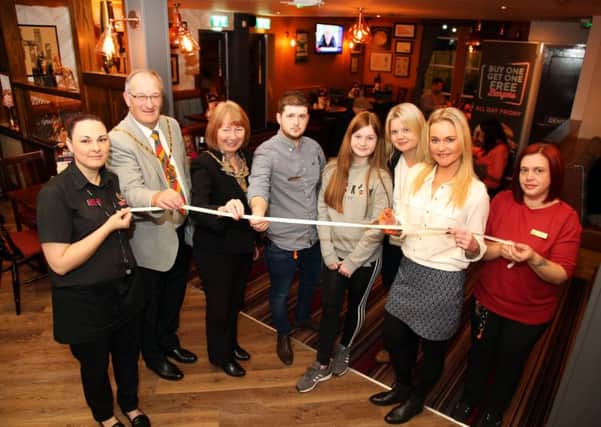 Pub Refurbished: Wellingborough: Ock 'n' Dough official opening after refurbishment. 
Standing in what was once the soft play area, VIPs cut the ribbon at the opening. 
Tuesday November 28th, 2017 NNL-171128-194209009