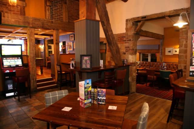 Pub Refurbished: Wellingborough: Ock 'n' Dough official opening after refurbishment.
Standing in what was once the soft play area, VIPs cut the ribbon at the opening.
Tuesday November 28th, 2017 NNL-171128-194155009