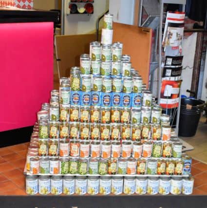Some of the tins donated by Plumbco