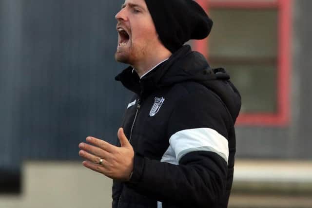 Steve Kinniburgh was delighted with the result, if not the performance, as Corby Town claimed a 1-0 success at Romulus