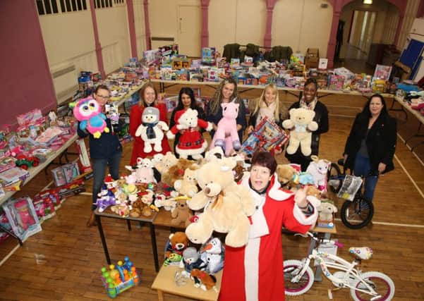 Jeanette Walsh with the donated toys