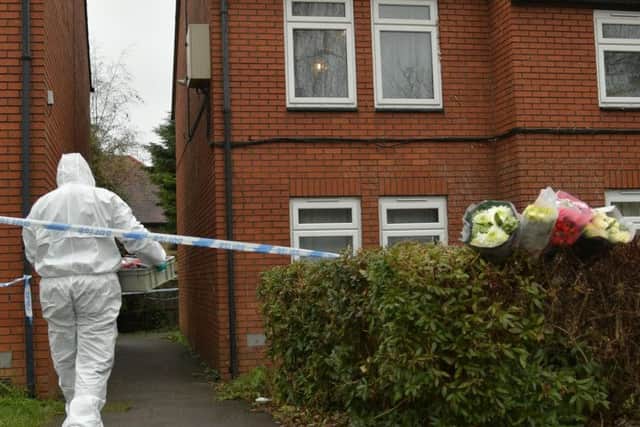 Forensics officers at the house over the weekend