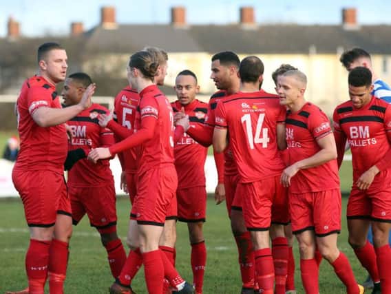 Kettering Town celebrate Rene Howe's goal, which opened the scoring in the 6-0 demolition of Dunstable Town at Latimer Park. Pictures by Alison Bagley