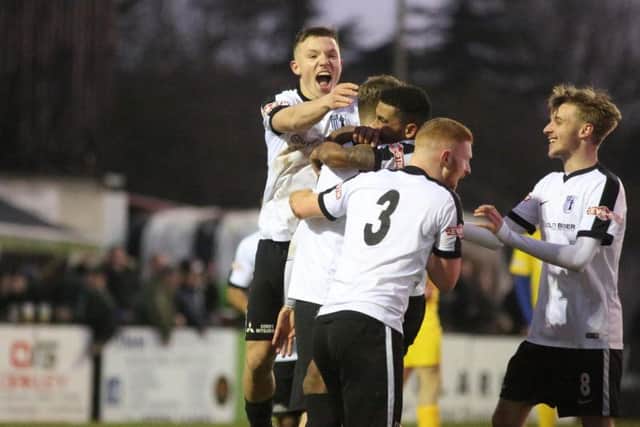 Corby Town celebrate Cameron Healey's goal during the 3-1 win over Spalding United on Saturday. The Steelmen make the short trip to Stamford today (1pm). Picture by Alison Bagley