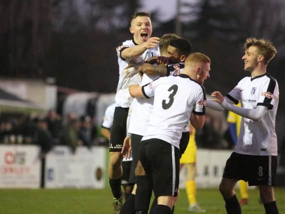 Corby Town celebrate Cameron Healey's goal during the 3-1 win over Spalding United on Saturday. The Steelmen make the short trip to Stamford today (1pm). Picture by Alison Bagley