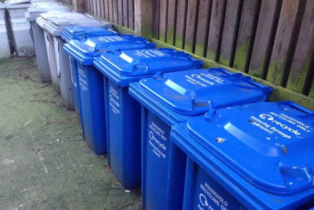 GV of Kettering Borough Council's blue recycling wheely bins NNL-140224-112755001