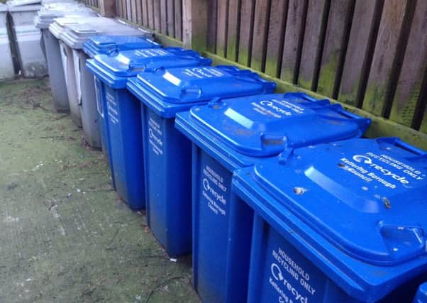GV of Kettering Borough Council's blue recycling wheely bins NNL-140224-112755001