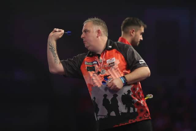 Rushden's James Richardson in action during his defeat to Jamie Lewis at the World Championship. Picture by Lawrence Lustig/PDC