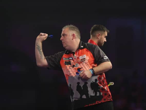Rushden's James Richardson in action during his defeat to Jamie Lewis at the World Championship. Picture by Lawrence Lustig/PDC
