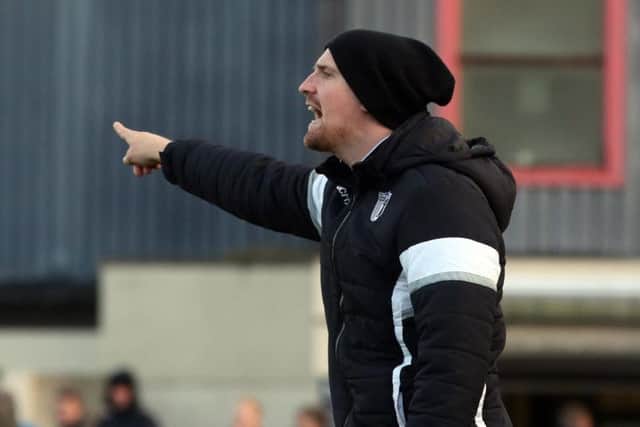 Steve Kinniburgh wants a reaction from his Corby Town players when they start 2018 with a home clash against Bedworth United this afternoon