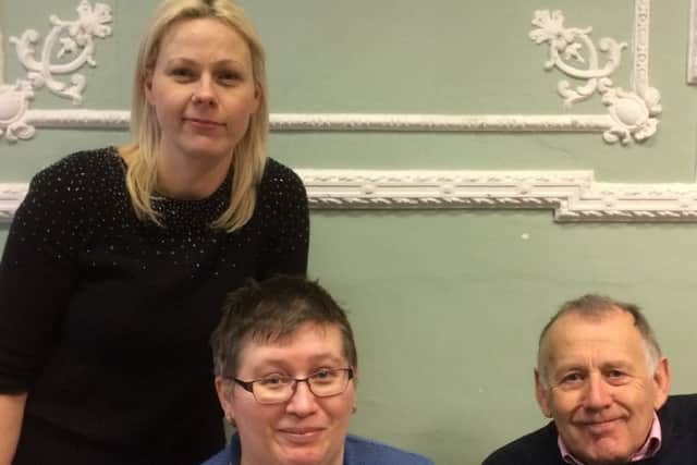 Emily Tyler (lead advice session supervisor), Dianne Perrin (volunteer) and Paul Curran (Bridge Project worker)