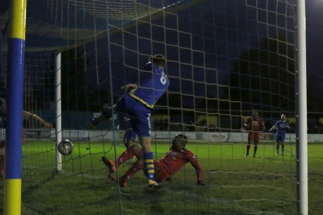 Mathew Stevens brought Kettering Town level at 2-2 with this strike at Basingstoke Town last weekend but a late goal condemned them to a 3-2 defeat. The Poppies will bid to bounce back against Kings Langley at Latimer Park this weekend. Picture by Peter Short