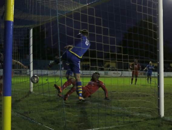 Mathew Stevens brought Kettering Town level at 2-2 with this strike at Basingstoke Town last weekend but a late goal condemned them to a 3-2 defeat. The Poppies will bid to bounce back against Kings Langley at Latimer Park this weekend. Picture by Peter Short