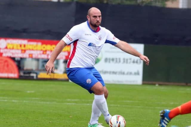 Captain Liam Dolman scored twice as AFC Rushden & Diamonds moved three points clear at the top with a 4-0 success at Aylesbury FC