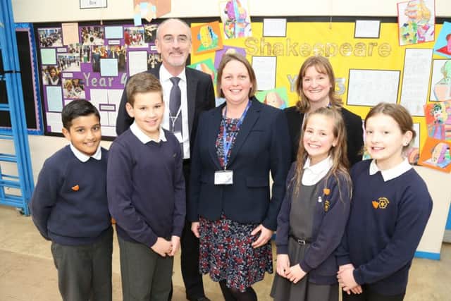 Back row from left: Chair of governors Phil Harris-Bridge, headteacher Danielle Warren and deputy headteacher Karen Harrison with pupils. NNL-180118-154607005