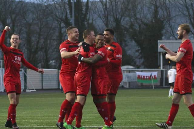 Brett Solkhon takes he congratulations after making it 4-0 to the Poppies