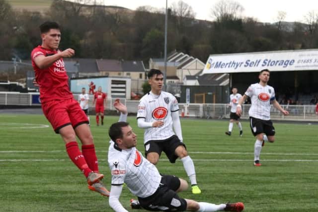 Mathew Stevens fires home his goal for Kettering