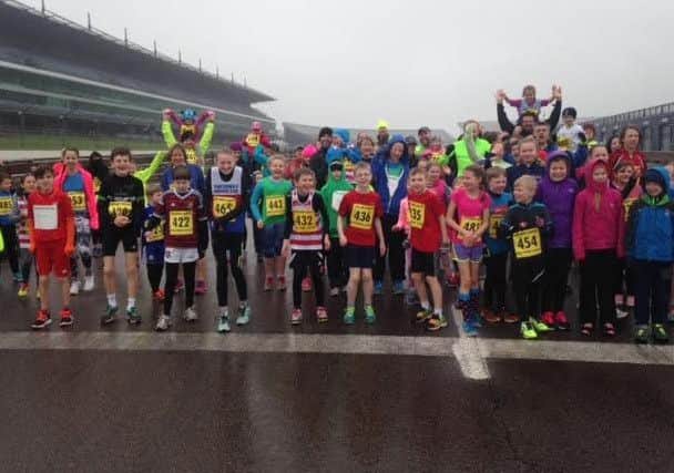 The Brass Monkeys run at Rockingham Speedway for Corby's Lakelands Hospice
