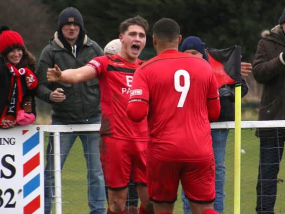 Mathew Stevens shows his delight as he celebrates scoring Kettering Town's first goal in the 3-1 victory over Biggleswade Town at Latimer Park. Picture by Peter Short