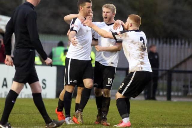 Action from Corby Town v Frickley