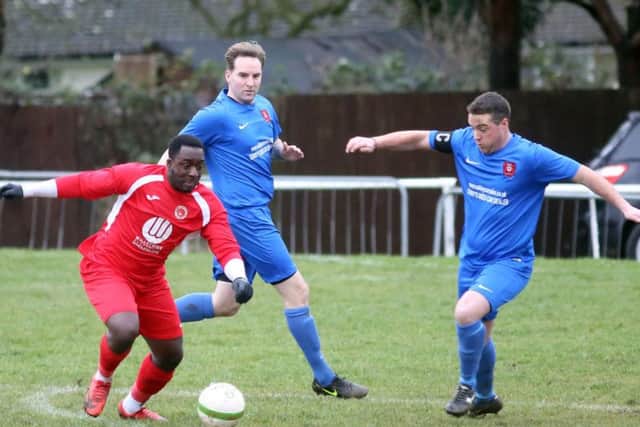 Action from Stewarts & Lloyds' 4-1 home defeat to Buckingham Town in Division One of the United Counties League last weekend