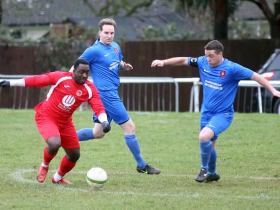 Action from Stewarts & Lloyds' 4-1 home defeat to Buckingham Town in Division One of the United Counties League last weekend