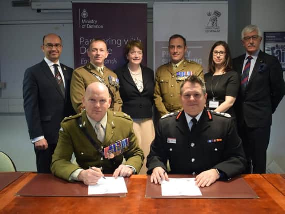 The signing was attended by representatives from the Armed Forces and MoD, Northamptonshire County Council, and NFRS