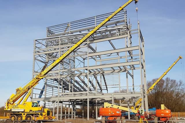The steel frame of the cinema at Rushden Lakes