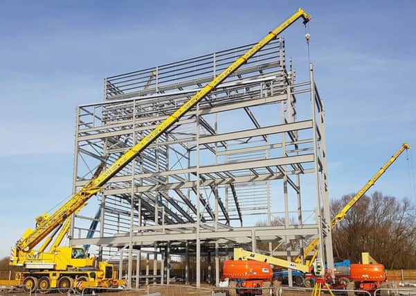 The steel frame of the cinema at Rushden Lakes